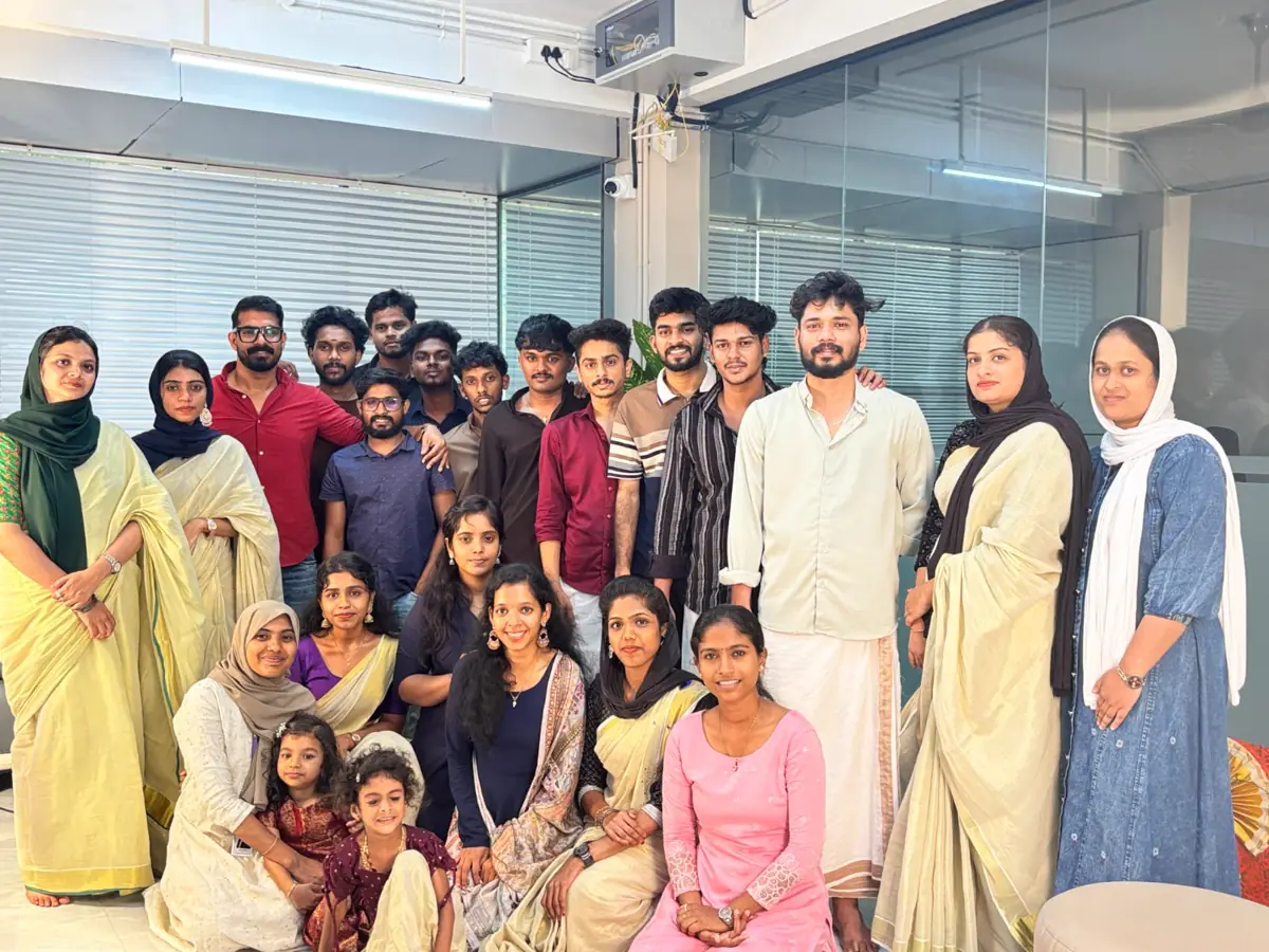 The SilverHost team in traditional dress at a festival celebration in the office